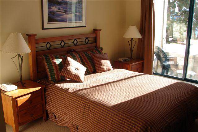 A master bedroom with private deck