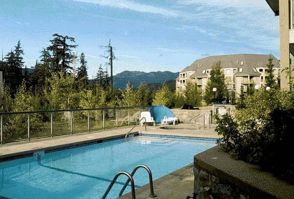 Outdoor common swimming pool at Greystone Lodge