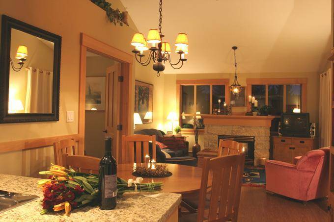 Relax in front of the stone fireplace after a long ski day
