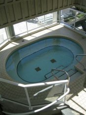 Enjoy the hot tub at Wildwood Lodge